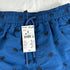 Blue Swim shorts with leaves